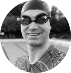 Man wearing swim cap and smart swim goggles