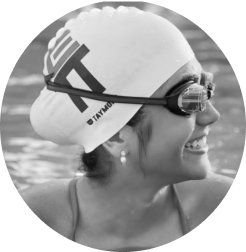 Woman wearing Smart Swim Goggles and Smiling in the pool